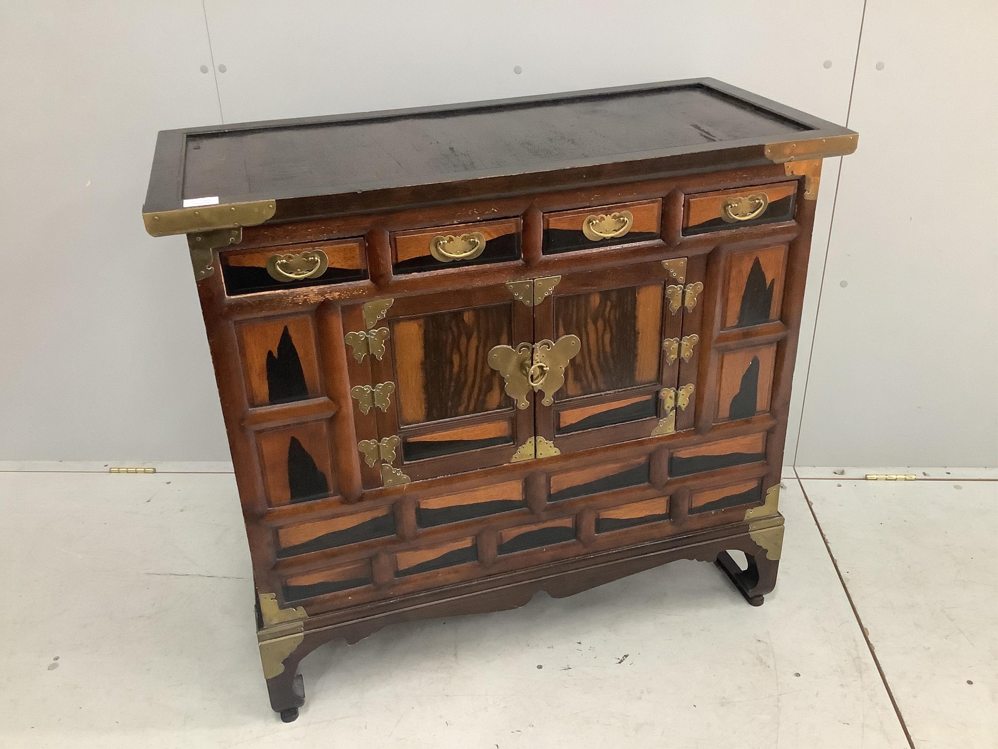 A Japanese or Korean persimmon wood (?) Tansu chest of drawers, width 98cm, depth 45cm, height 88cm. Condition - fair to good